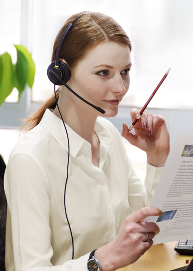 Office employee in a meeting using Addasound Crystal 2872 headset