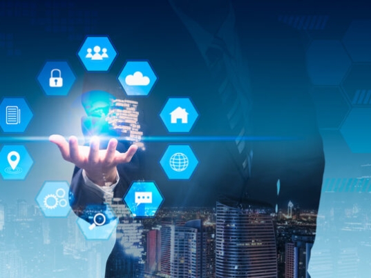 Double exposure business man with social media and digital technology. cityscape background.