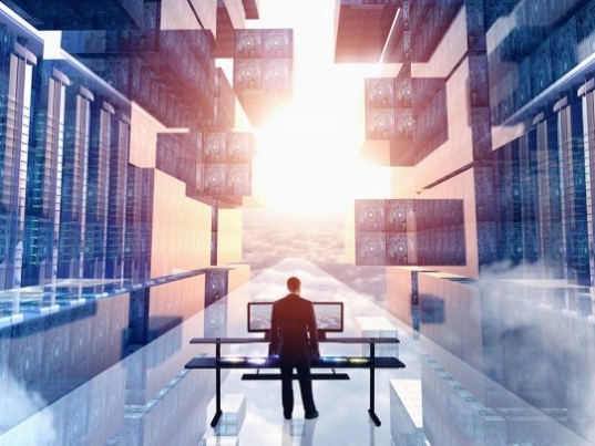 man-standing-desk-servers-city-1400x700-1-810x405